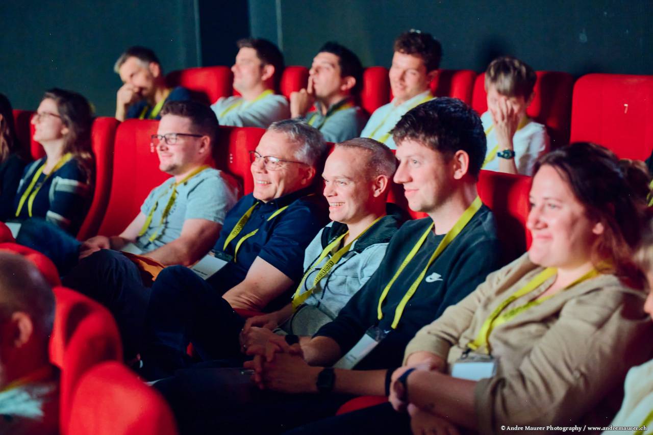 Menschen im Kinosaal am CMI Event